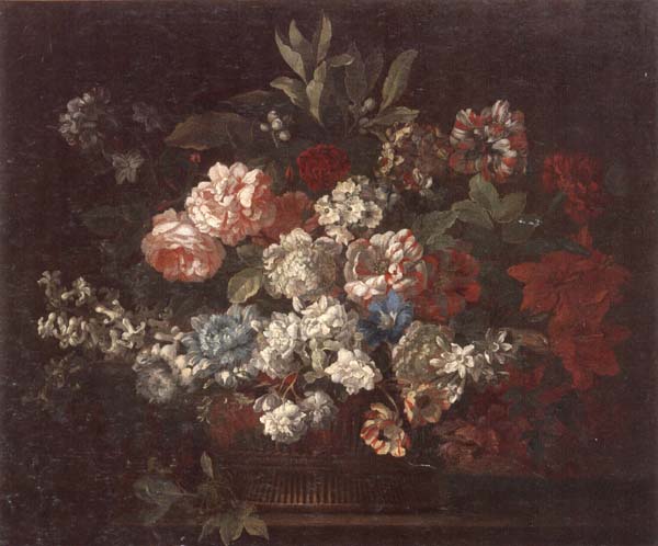 Still life of various flowers,in a wicker basket,upon a stone ledge